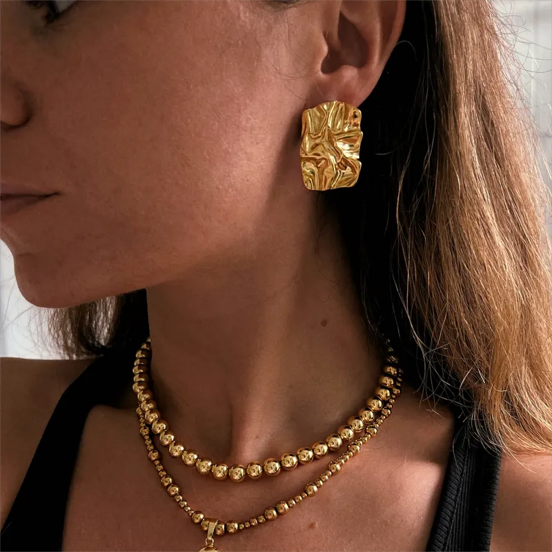 Statement Roman Earrings in Gold