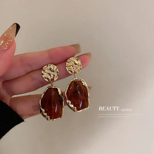 Gold drop down earrings